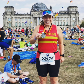 Clare with her medal in front of the Reichstag