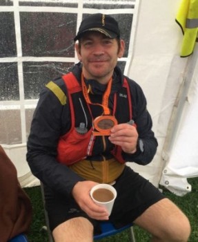 Phil, his medal and a cuppa at the finish of LLCR